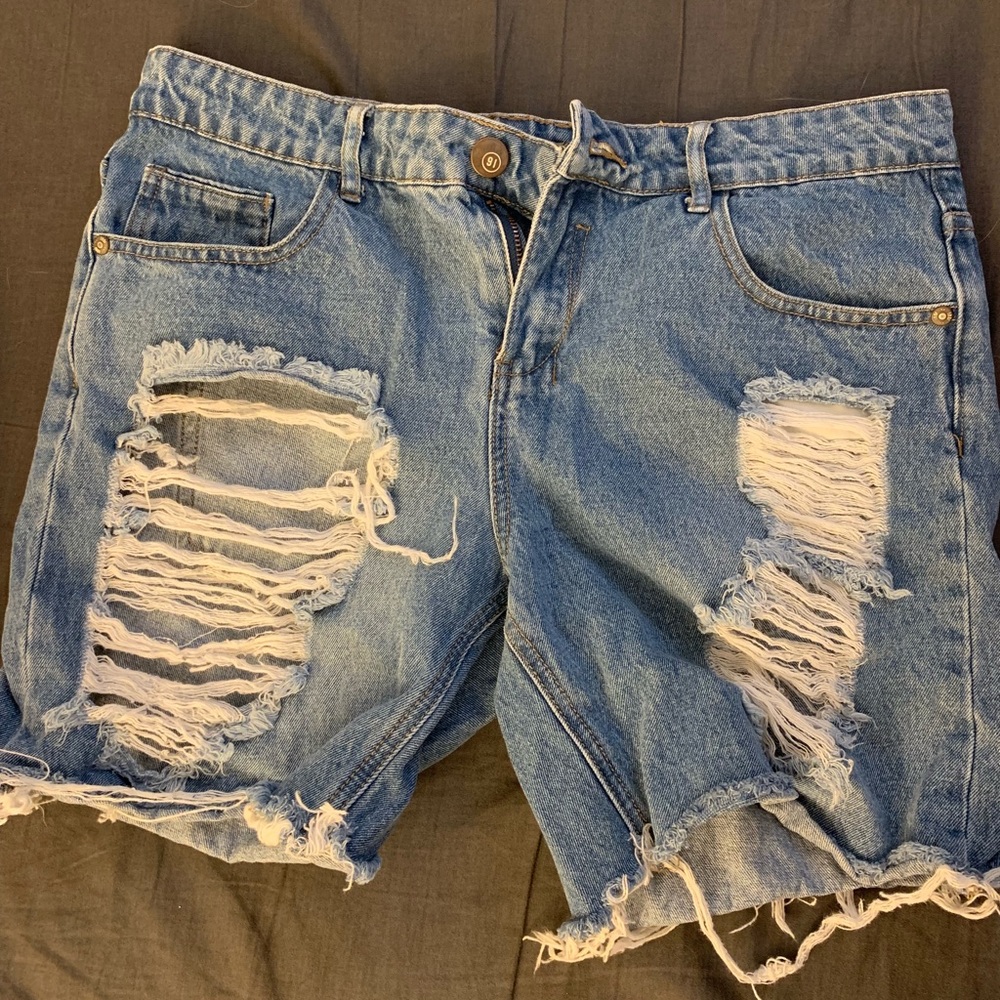Ripped Bermuda jean shorts